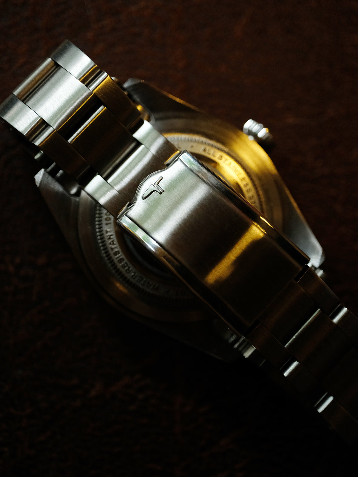 DAGGER A.X.E. Brown Dial vintage dive watch top view showing black rotating bezel