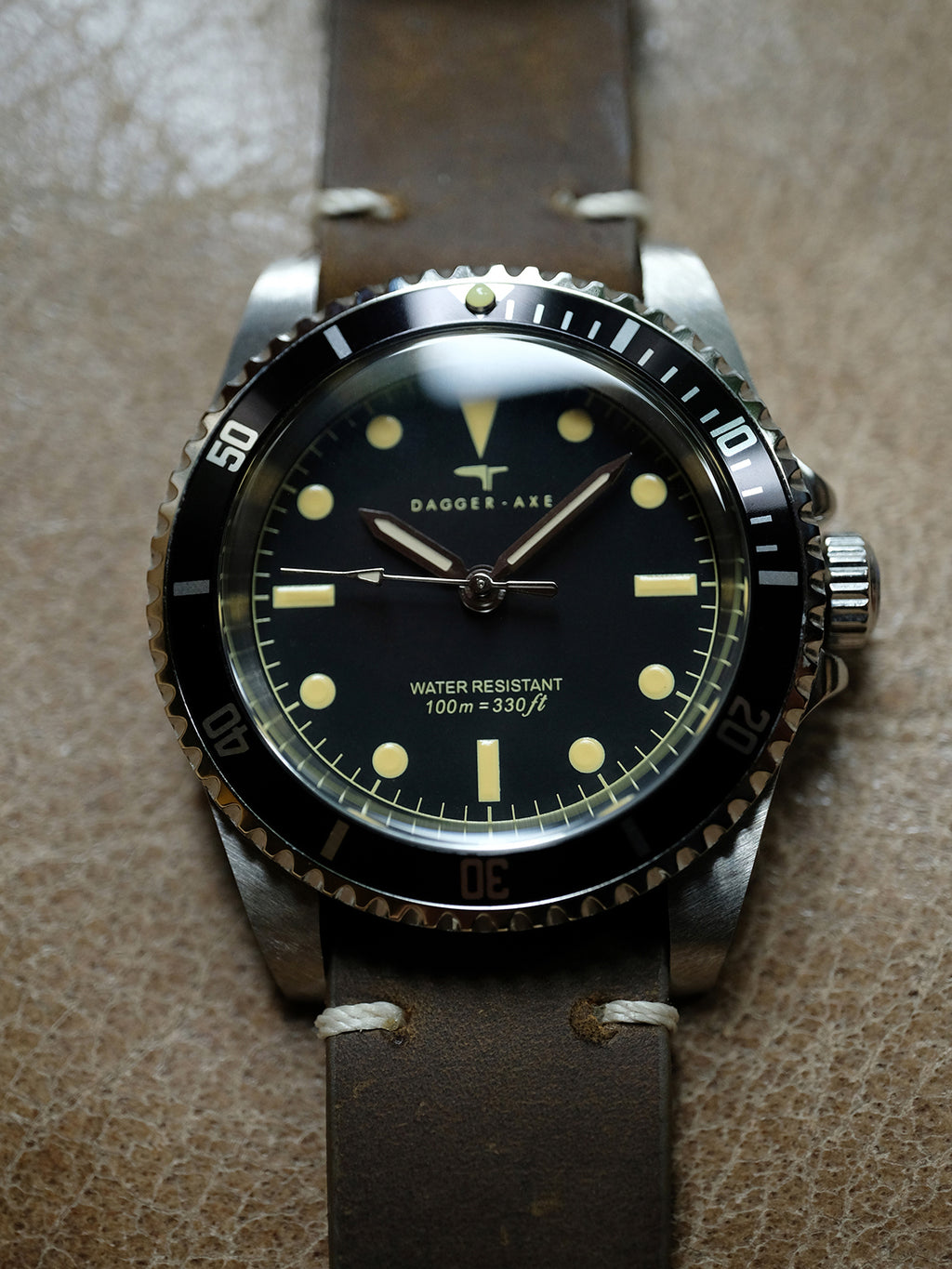 DAGGER A.X.E. MK1 watch dial with luminous hour markers and vintage bezel
