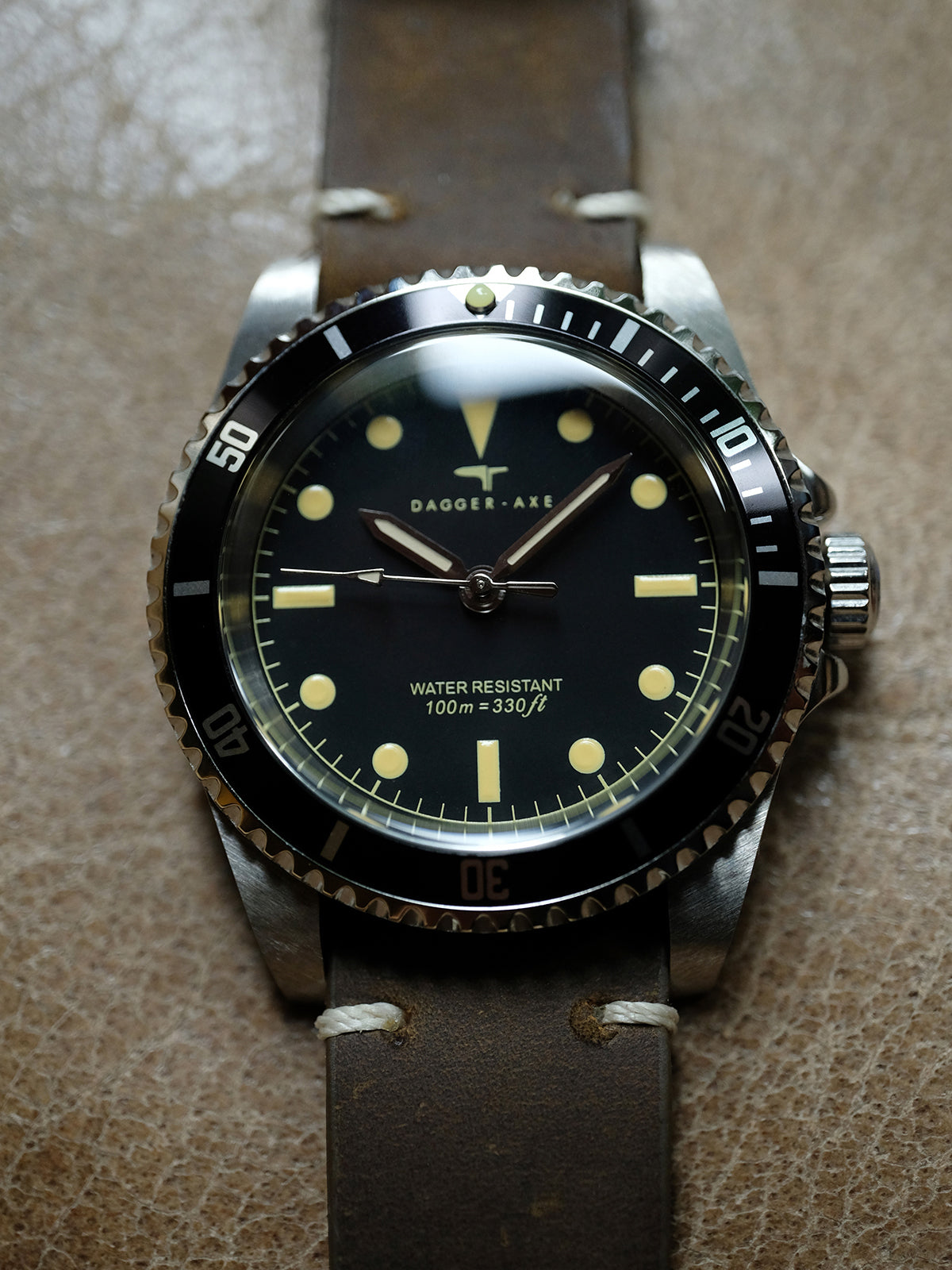 DAGGER A.X.E. MK1 watch dial with luminous hour markers and vintage bezel
