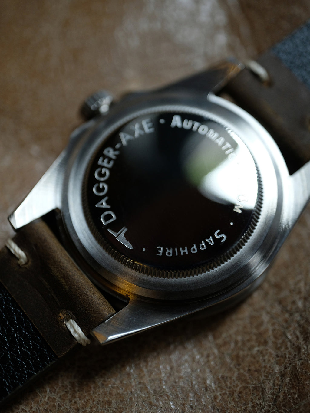 DAGGER A.X.E. MK1 watch crown and case side detail with brushed finish