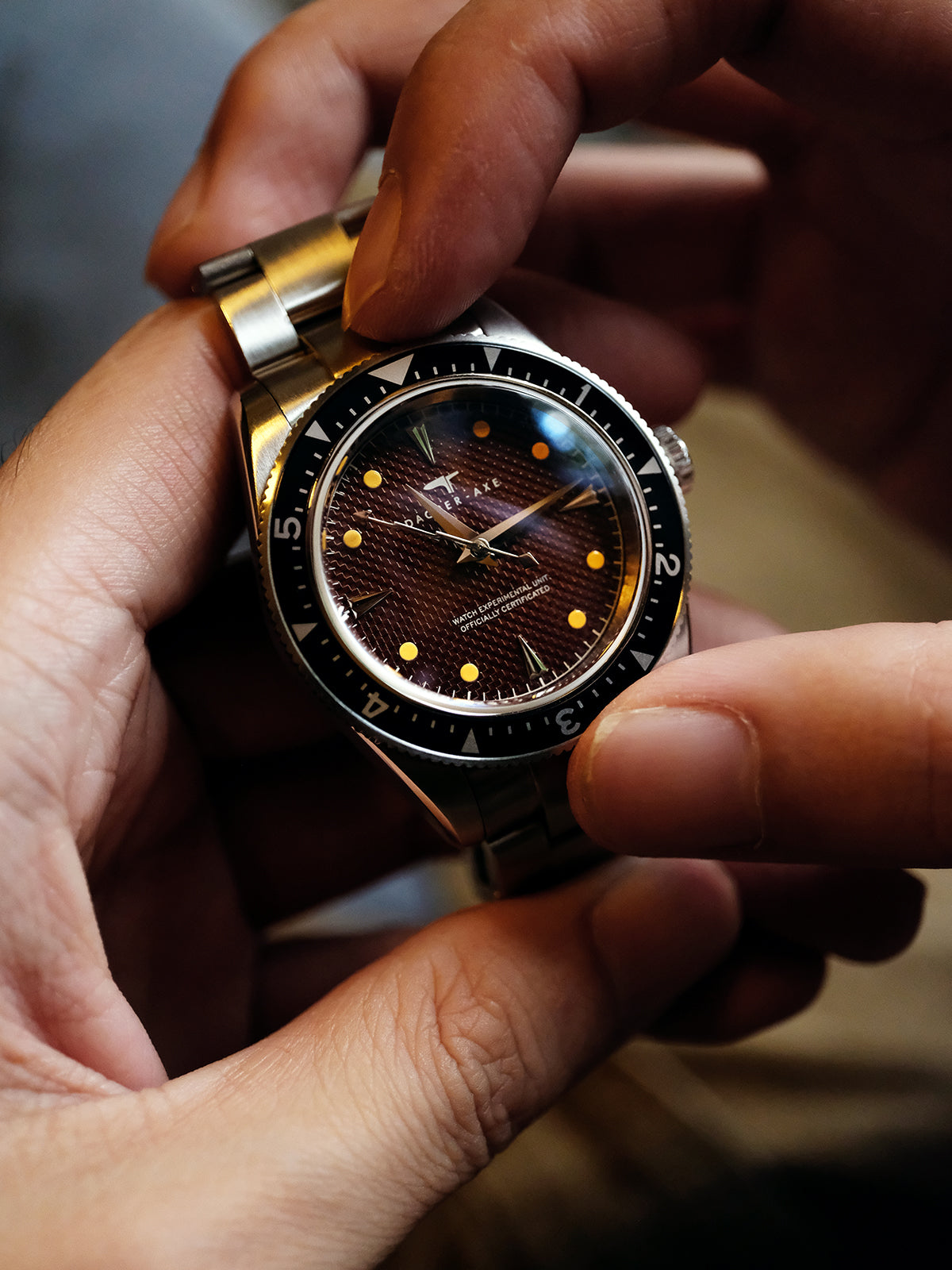 DAGGER A.X.E. Brown Dial watch crown and case side detail with brushed finish
